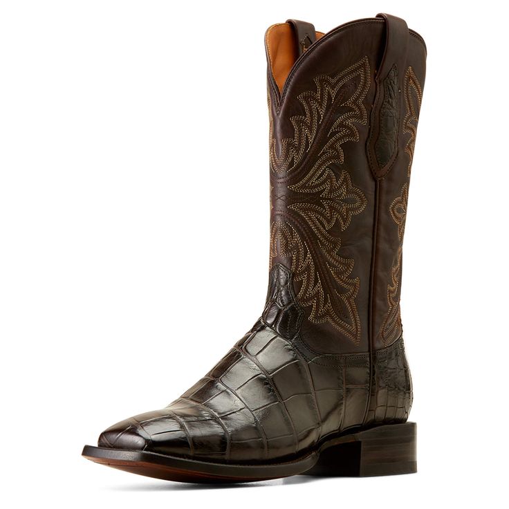 Old-world techniques transform premium American Alligator belly leather into timeless Western boots that are built to last. Handcrafted by artisan bootmakers in León, Mexico, Bassett is top-quality footwear—supple and ultra-comfortable right out of the box. Bench Made Bassett Western Boot | Product Features : 0 : Premium American alligator belly leather, 1 : Removable All Day Cushioning insole with genuine vegetable tanned, anti-odor leather sock liner that molds to your foot, 2 : Cork filled fo Black Western Boots, Square Toe Cowboy Boots, American Alligator, Country Boots, Leather Socks, Leather Cowboy Boots, Western Boot, Liner Socks, Leather Conditioner