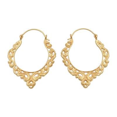 Designed by Made Nuada in Bali these hoop earrings feature ornately elegant arabesque motifs. The earrings are crafted of 18k yellow gold plated brass. Yellow Gold Brass Hoop Earrings With Intricate Design, Ornate Brass Hoop Earrings, Gold Festival Earrings With Intricate Design, Ornate Gold Hoop Earrings With Filigree, Gold Earrings With Intricate Design For Festival, Ornate Gold Hoop Earrings For Festivals, Ornate Yellow Gold Hoop Earrings With Intricate Design, Ornate Hoop Earrings For Festivals, Elegant Festival Hoop Earrings With Intricate Design