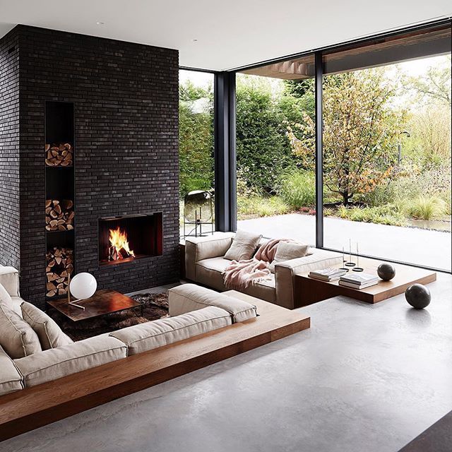 a living room with a fire place in it