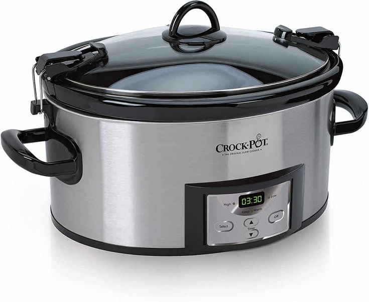 the crock pot is on display with its lid open and it's time to cook