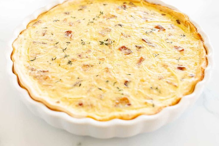 quiche in a white quiche dish Cream Cheese Pie Crust, Persnickety Plates, Delicious Quiche, Easy Quiche, Cream Cheese Pie, Julie Blanner, Cheese Enchiladas, Quiche Recipe, Crustless Quiche