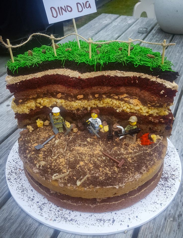 a cake that has been made to look like a giant sandwich with legos on it