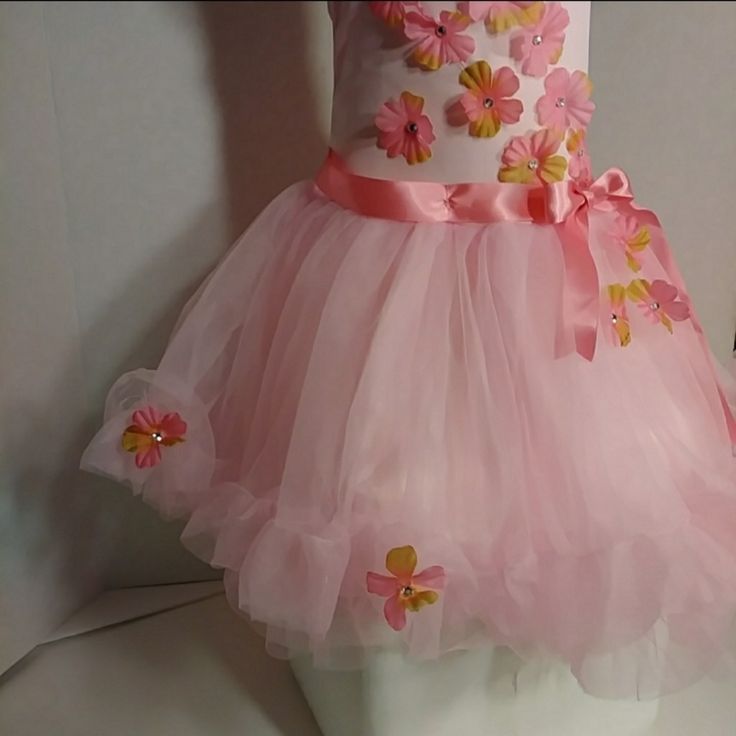 New Beautiful Pink Tulle Flower Girl Dress Or Birthday Dress With Silk Flowers Attached On Top And Sprinkled Throughout The Tulle. Plus Additional Bonus, A Matching Flower Halo With Hanging Tulle & Pink Satin Ribbons. From A No-Smoking Home With No Pets. Pink Floral Princess Dress For Party, Floral Applique Tutu Dress For Summer Dress-up, Summer Floral Applique Tutu Dress For Dress-up, Pink Princess Tutu Dress For Spring, Fitted Pink Princess Dress With Floral Print, Fitted Floral Applique Tutu Dress For Spring, Pink Tutu Dress For Summer Garden Party, Pink Summer Tutu Dress For Garden Party, Fitted Tutu Dress With Floral Applique For Spring