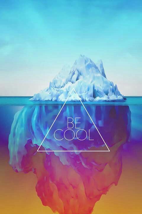 an iceberg floating on top of the ocean with a triangle above it that says be cool