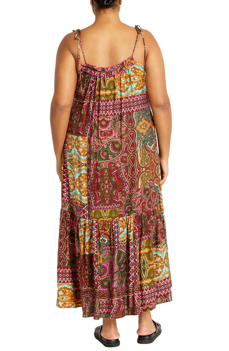 A mix of patterns in bright colors calls attention to a breezy maxi dress in a tiered silhouette perfect for brunches and market strolls. 45" center back length (size X-Small) Slips on over head Square neck Adjustable tie straps 80% viscose, 20% nylon Hand wash, dry flat Imported Bohemian Tiered Dress For Vacation, Bohemian Tiered Maxi Dress For Vacation, Bohemian Tiered Sundress For Vacation, Flowy Bohemian Tiered Dress For Vacation, Summer Tiered Maxi Dress With Print, Summer Tiered Printed Maxi Dress, Multicolor Tiered Summer Dress, Multicolor Sleeveless Tiered Summer Dress, Multicolor Floral Print Tiered Dress