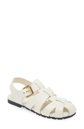 The Milanese label's intrecciato weave adds signature flair to a calfskin fisherman sandal finished with a softly squared, polished buckle. Adjustable ankle strap with buckle closure Leather upper and lining/rubber sole Made in Italy Designer Shoes White Leather Sandals With Rectangular Buckle, White Calf Leather Sandals With Buckle Closure, Luxury Summer Sandals With Rectangular Buckle, Luxury Woven Leather Sandals For Summer, Summer Woven Calf Leather Sandals, Spring Closed Toe Sandals With Intrecciato Weave, Spring Woven Calf Leather Sandals, Luxury Leather Sandals With Intrecciato Weave, Designer Woven Leather Sandals In Calf Leather