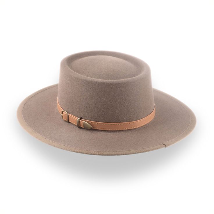 Description Materials Craftsmanship Hat Care Shipping Returns Product Description Taupe Brown Wide Brim Hat for Country Charm Embrace the spirit of the West with the Baron, a flat brim telescope cowboy hat crafted from premium bison fur felt. Designed for those who value tradition with a modern twist, this luxury hat features a unique telescope crown and a wide brim for maximum sun protection. Custom-fitted to your exact head measurements, The Baron offers a smooth finish, a grosgrain ribbon hat Mens Felt Hats, Cowboy Hat Crafts, Spanish Hat, Homburg Hat, Gambler Hat, Country Hats, Mens Hats Fashion, Fedora Hat Men, Luxury Hats