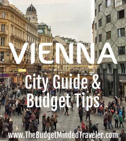 a group of people walking down a street next to tall buildings with the words vienna city guide and budget tips