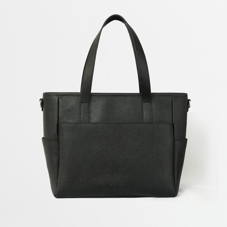 This structured tote is the ultimate do-it-all bag that you deserve. It's the perfect carryall for work, travel, and anywhere your day brings you. It features a spacious and organized interior for your essentials, a padded compartment for your laptop, side pockets for your drinks, and you can convert it into a backpack or crossbody. Crafted from premium American Saffiano leather that's waterproof and scratch-resistant, the Transform Tote will stay just as beautiful through all your travels and a Concealed Carry Purse, Work Backpack, Laptop Tote, Luggage Straps, Best Bags, Backpack Straps, Work Bag, Work Bags, Black Tote