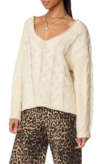 A perfect grab-and-go sweater–this one boasts cozy cable stitching and dropped shoulders for an ultra-relaxed fit. V-neck Long sleeves 100% acrylic Machine wash, dry flat Imported Oversized Cable Knit Sweater, Stitch Sweater, Cable Stitch, Cable Knit Sweater, Signature Design, Knitwear Women, Cable Knit, Knit Sweater, Sweater Top