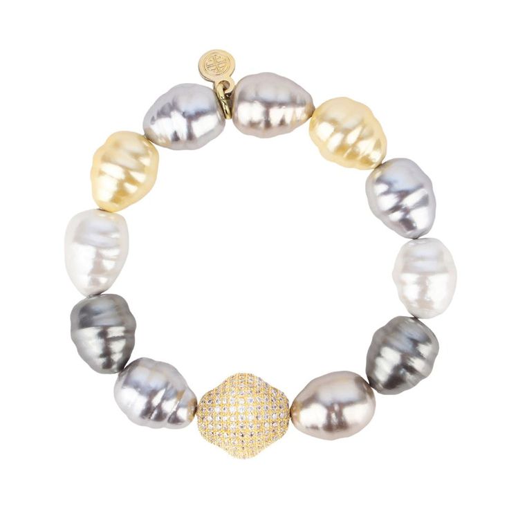 Sublime Baroque pearls in shades of starlight are a must for a statement-making wristscape™.  The beautiful, irregular shape and delicate shading of our Baroque pearls allow you to mix the Isabel bracelet with any of our gorgeous metallic shades of Etoile, Classic Gold, Silver, or Champagne AWB®. A gold drop-shaped accent bead is studded with tiny clear crystals giving Isabel an even more glamorous look. One size fits most. Handcrafted in the US.  Mindful Glamour Ritual:  Pause. Breathe. Slip on your Isabel Baroque pearl bracelet while thinking that a pearl, a thing of such refined beauty was caused by an irritant. Focus on how your struggles have caused your growth and uniqueness.  Thought: “Next to sound judgment, diamonds and pearls are the rarest things in the world.” Jean de la Bruyer Diamonds And Pearls, Star Jewelry, Unique Bracelets, Clear Crystals, Classic Gold, Baroque Pearls, Pearl Bracelet, Ring Bracelet, Clear Crystal