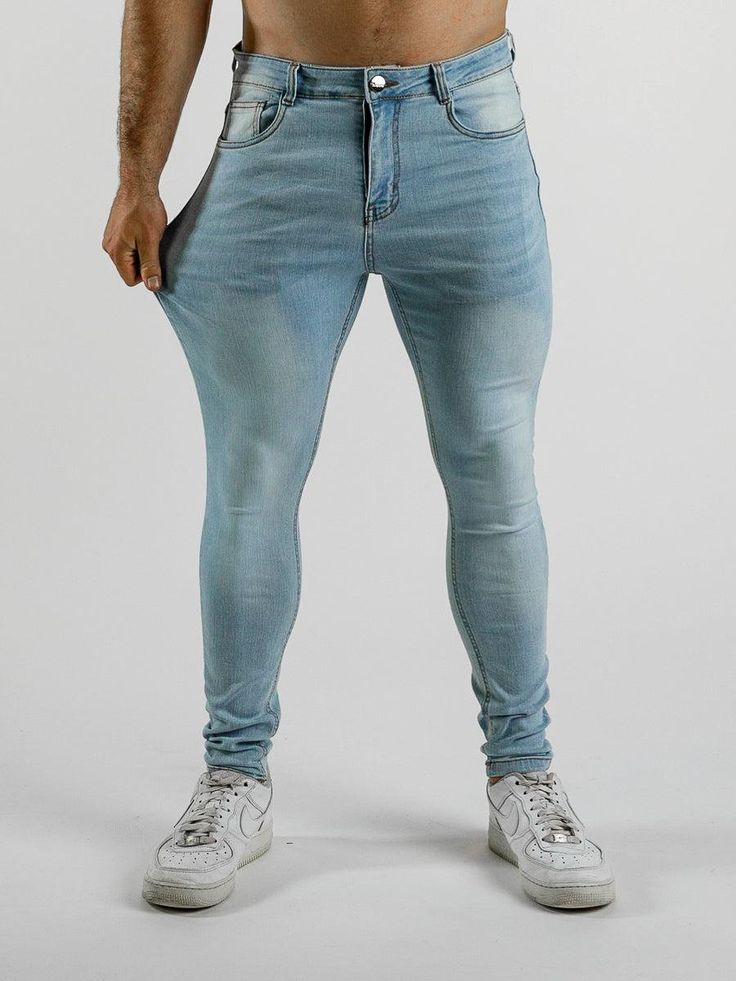 ✓ Versatile Skinny Fit - A perfectly fitted look from waist to ankle with no saggy areas on slim guys, with stretch to accommodate larger muscular thighs, glutes and calf muscles. ✓ Ultra-Stretch Denim - Luxurious denim elastane blend to give a flexible waist and leg fit, plus full freedom to move with comfort qualities more like activewear. ✓ Stylish Jeans - Understated design, with a satisfying real denim weight, for a classy modern look in Light Blue washed to ice blue tones across the thighs Casual Slim Elastane Bottoms, Fitted Denim Pants With Standard Cut Leg, Streetwear High Rise Slim Fit Bottoms, High Rise Slim Fit Jeans For Streetwear, High Rise Slim Fit Bottoms For Streetwear, Fitted Straight Leg Bottoms For Streetwear, Fitted Full-length Jeans For Streetwear, Fitted Full-length Denim Blue Bottoms, Fitted Medium Wash Cargo Pants