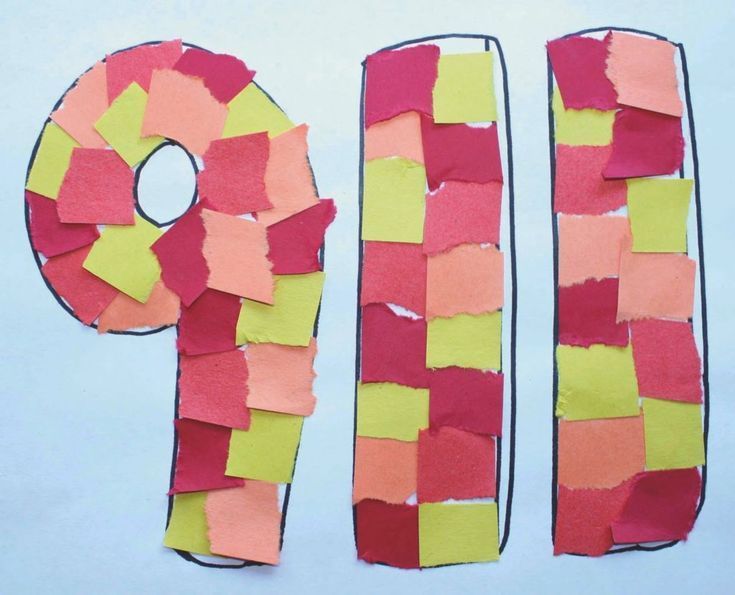 the letter o is made out of construction paper and strips of torn up colored paper