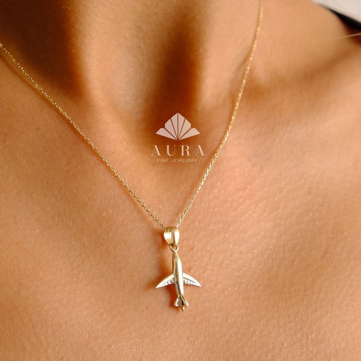 "14K Gold Airplane Necklace, Airplane Pendant, Tiny Airplane Charm, Dainty Gold Plane Necklace, Travel Jewelry, Pilots Flight Attendant Gift Features *Material: 14K Real Gold *Color Options: Yellow Gold, White Gold, Rose Gold *Metal Stamp: 14K (585) *Available Necklace Sizes: 14Inches to 20Inches  *Weight(approx) : 2.25 grams *Ready to Ship in 3-5 Business Days. FREE Express worldwide shipping. FREE Engraving service Each item is made to order. Comes in a Gift Box with 14K Gold Certificate. This Necklace Airplane, Airplane Pendant, Plane Necklace, Necklace Travel, Airplane Necklace, Gold Certificate, Mens Gold Jewelry, Fine Jewelery, Jewelry Accessories Ideas