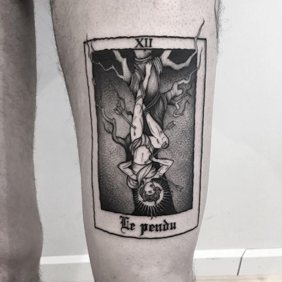 a man's leg with a tattoo on it that reads, the penon