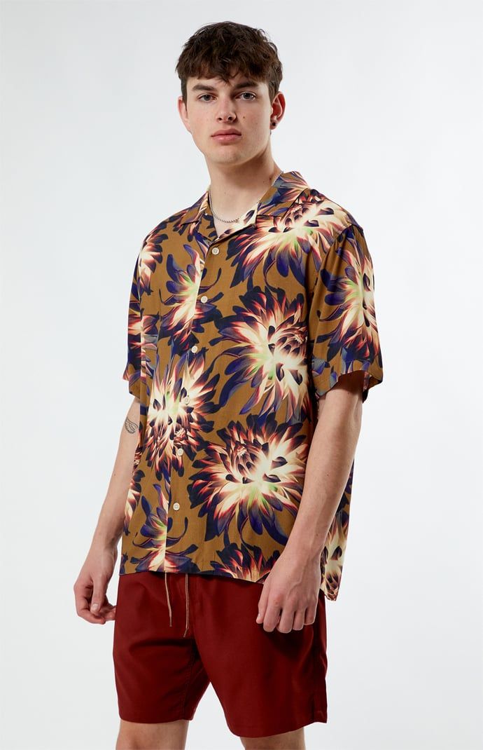 Embrace the essence of summer with our PacSun Printed Camp Shirt. Boasting a collared neckline, short sleeves, and a lightweight feel, it's the epitome of laid-back comfort. Featuring a custom pattern and button closures, this shirt brings a touch of vacation vibes to any outfit.


	Collared neckline
	Short sleeves
	Standard fit
	Button closures
	Lightweight
	Custom pattern
	100% Viscose
	Machine washable
	Model is wearing size medium
	Model Measurements: 6'1” Height, 31” Waist, 33” Inseam Summer Beach Shirt With Collared Neckline, Summer Vacation Camp Shirt With Collared Neckline, Summer Vacation Short Sleeve Shirt With Collared Neckline, Yellow Short Sleeve Camp Shirt For Summer, Yellow Short Sleeve Shirt For Summer, Yellow Summer Shirt With Camp Collar, Summer Vacation Short Sleeve Shirt With Johnny Collar, Yellow Short Sleeve Camp Shirt For Spring, Yellow Collared Camp Shirt For Summer