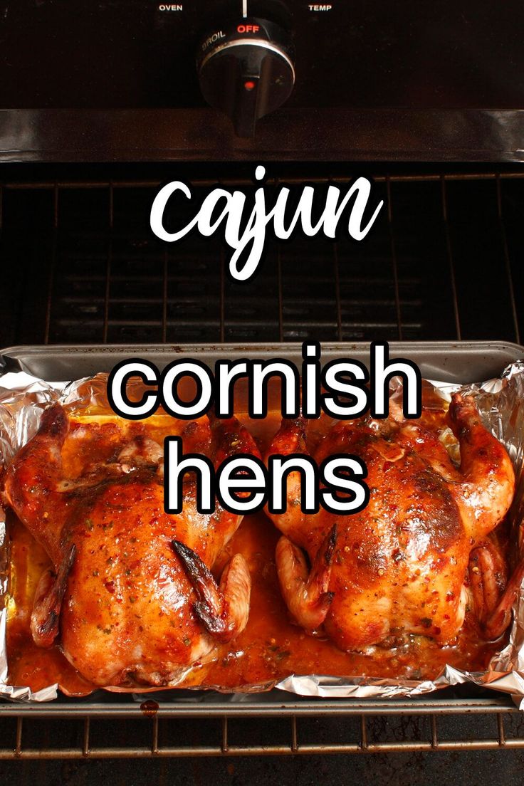 chicken cooking in an oven with the words cajun cornish hens