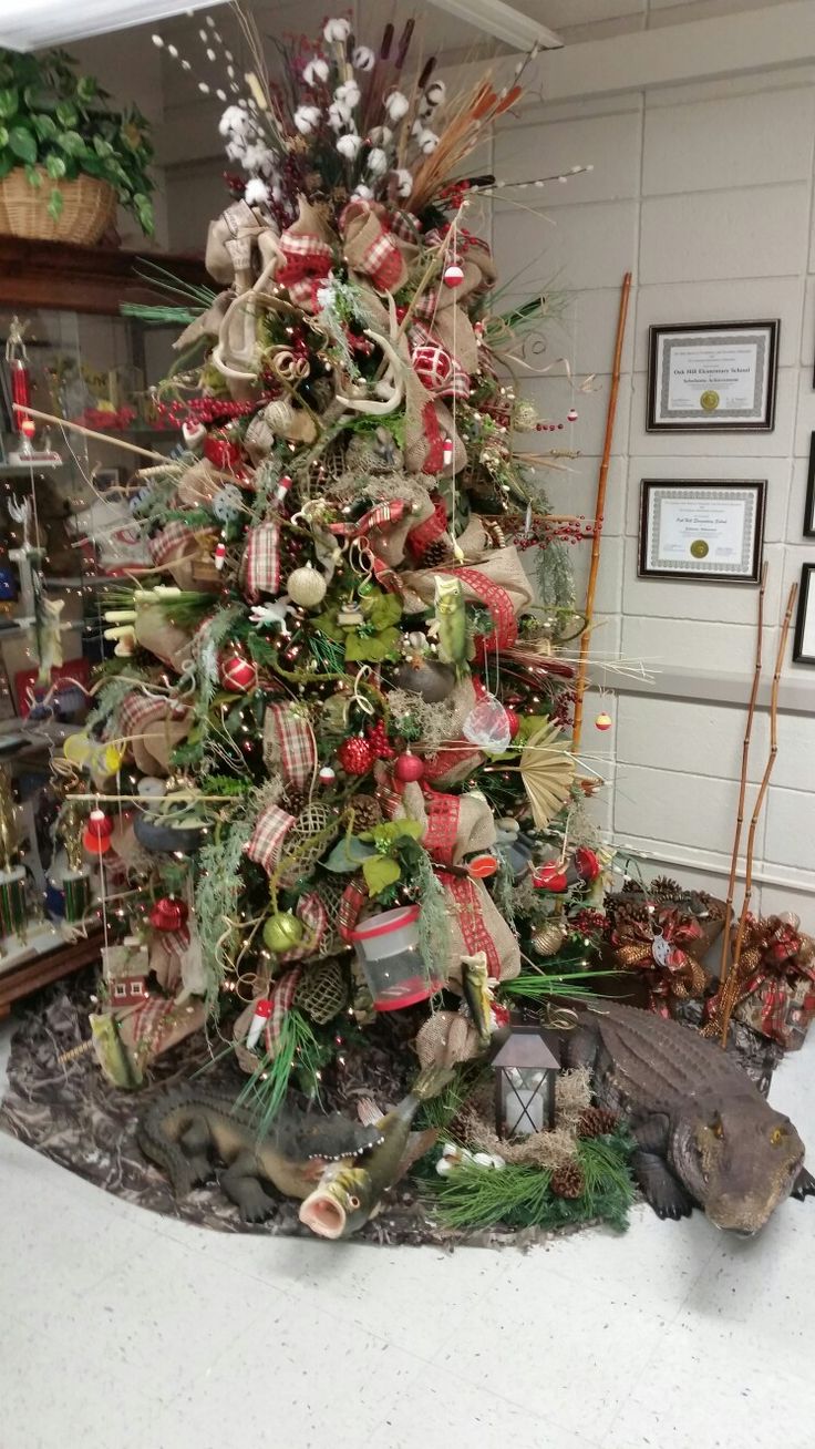 a decorated christmas tree in the corner of a room