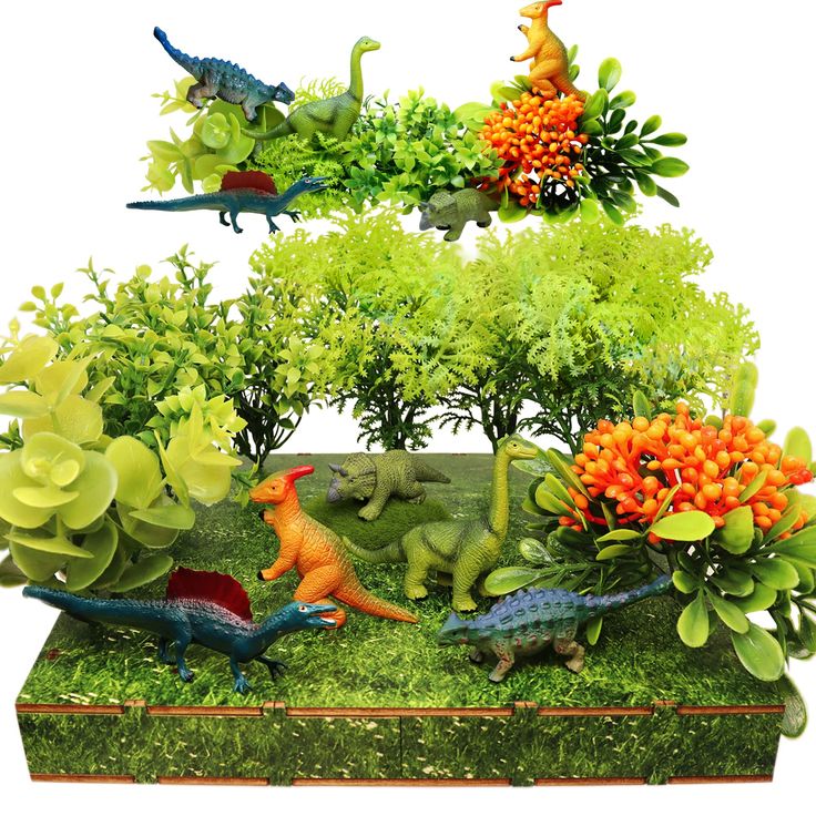 an assortment of plastic dinosaurs in the grass with trees and bushes behind them on a white background