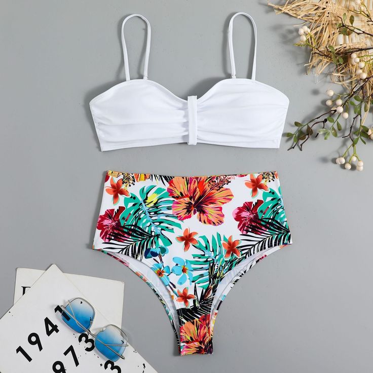 The Mililani Bikini Set is perfect for your next beach getaway! With a tropical pattern and fun tie element, this set will surely turn heads. The regular straps ensure a comfortable fit, and the polyester material is both durable and quick-drying. Don't miss out on this playful and stylish set! Specs: Material: Polyester High Waist Bikinis, Spring Bikinis, Elegant Fashion Outfits, Fun Tie, Women Gathering, Beach Getaway, Jumpsuit Elegant, Swimsuits High Waisted, Yoga For Men