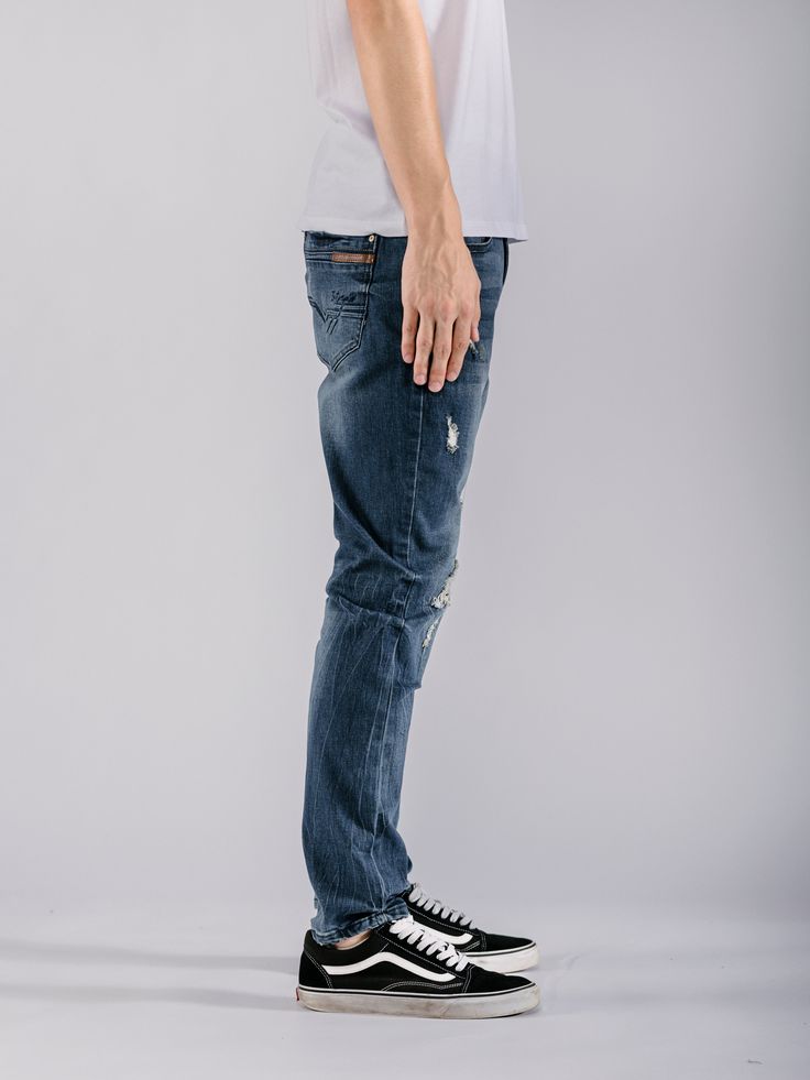 Effortlessly elevate your style with our Ripped Skinny Jeans. These simple and neat design jeans not only provide comfort, but also make for a stylish addition to any outfit. Easy to match, these jeans are a must-have for any fashion-forward individual. Achieve a sleek and flattering look with our Skinny Jeans. Fabric: 70% COTTON, 28% POLYESTER, 2% SPANDEX Machine wash cold Imported G4DB903S Size Chart Size 28 29 30 31 32 Waist 29 - 30.5 30.5 - 31.5 31.5 - 33.5 32.5 - 33.5 33.5 - 34.5 Size 33 34 Dark Wash Ripped Jeans For Everyday, Distressed Stretch Bottoms For Everyday, Everyday Stretch Distressed Bottoms, Stretch Distressed Bottoms For Everyday, Urban Medium Wash Jeans With Standard Cut, Urban Style Distressed Stretch Bottoms, Edgy Medium Wash Cotton Jeans, Stretch Jeans With Five Pockets For Streetwear, Urban Style Ripped Medium Wash Bottoms