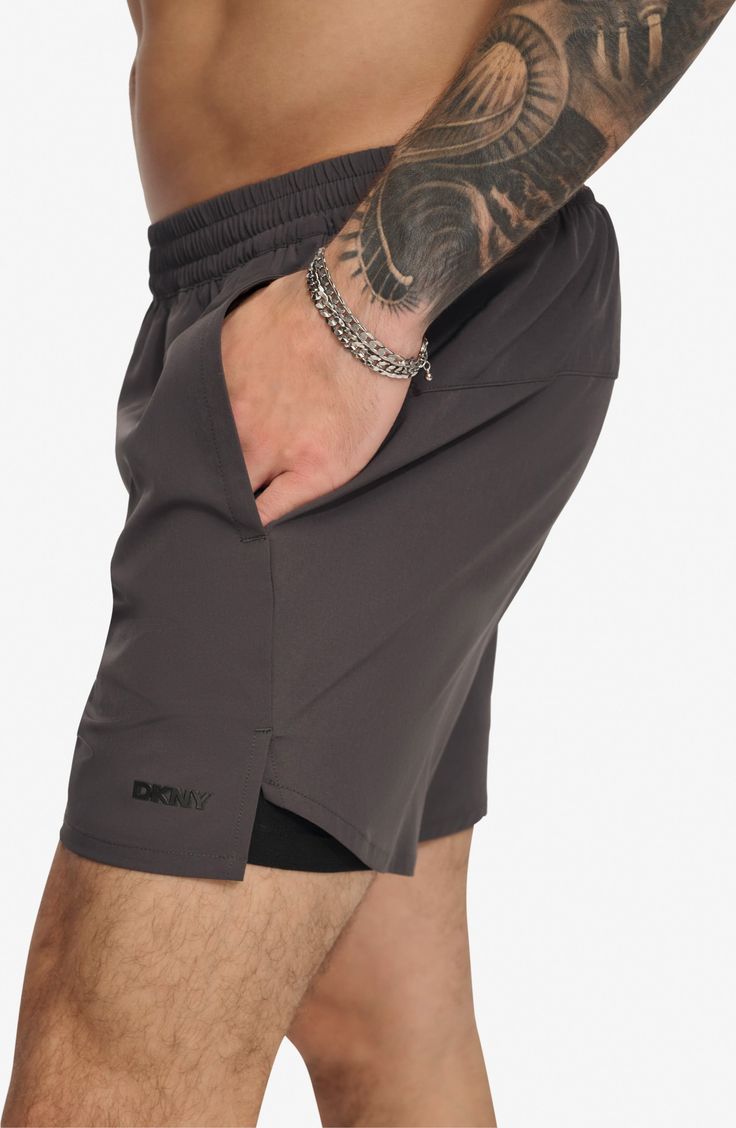 Hit the beach or kick it on the boardwalk in these quick-drying swim trunks built with UPF 40+ sun protection. 5" inseam (size Medium) Elastic waist On-seam slant pockets Lined UPF 40+ sun protection 94% polyester, 6% spandex Machine wash, line dry Imported Gray Activewear With Built-in Shorts For Summer, Gray Training Bottoms For Summer, Gray Nylon Summer Activewear, Gray Nylon Activewear For Summer, Gray Training Shorts For Summer, Go-dry Swim Trunks For Summer Training, Summer Training Swim Trunks With Go-dry Technology, Summer Workout Athletic Shorts In Recycled Polyester, Gray Summer Activewear With Elastic Waistband