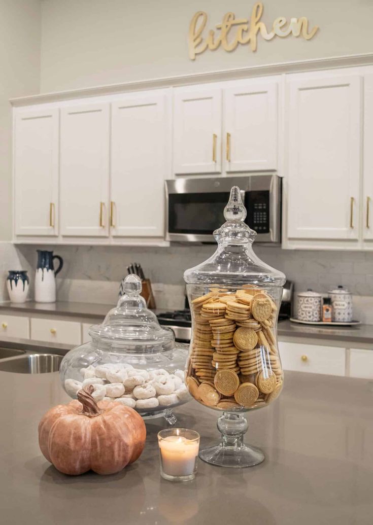 the kitchen counter is covered with cookies and other items