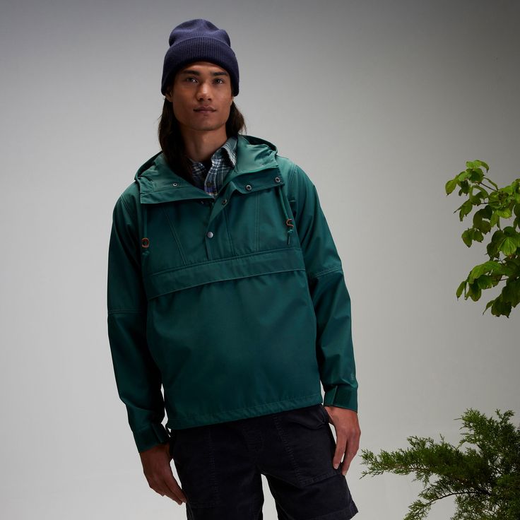 The Alpine Design Men's Anorak is a versatile addition to your travels. A secured zipper pocket and side seam zipper opening gives you the space you need to store your valuables. Adjustable sleeve cuffs and hem, as well as a cinchable hood, allow you to stay comfortable in any environment. When the weather changes, the water and wind-resistant fabric prepare you for the trip ahead. Fit & Design: Regular fit anorak The breathable construction helps keep you cool when the weather warms up The zip Utility Nylon Track Jacket For Outdoor Activities, Casual Windbreaker With Ykk Zipper For Travel, Casual Travel Windbreaker With Ykk Zipper, Functional Utility Jacket With Side Pockets For Travel, Outdoor Half-zip Nylon Track Jacket, Green Outdoor Outerwear With Zip Fly, Green Zip Fly Outerwear For Outdoor, Green Outerwear With Zip Fly For Outdoor, Casual Hooded Parka With Functional Pockets