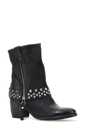 Double-down on contemporary Western styling in this leather boot designed with a dual zip closures and a fold-over-look shaft dotted with studs around the arch-grazing cuff. 3 1/2" heel; 1/2" platform 7 1/4" shaft Dual side-zip closures Leather upper and lining/synthetic sole Imported Edgy Winter Boots With Silver Studs, Rugged Moto Boots With Rivets For Fall, Leather Moto Boots With Spikes For Winter, Biker Boots With Rivets For Fall, Fall Punk Moto Boots With Silver Studs, Edgy Leather Moto Boots With Zipper Closure, Edgy Leather Moto Boots With Zipper, Edgy Leather Boots With Silver Studs, Punk Leather Moto Boots With Silver Studs