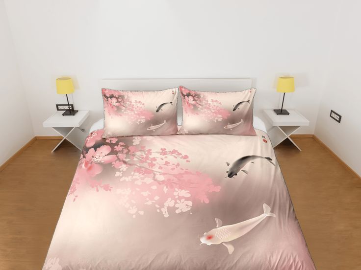 a bed with pink and white flowers on it