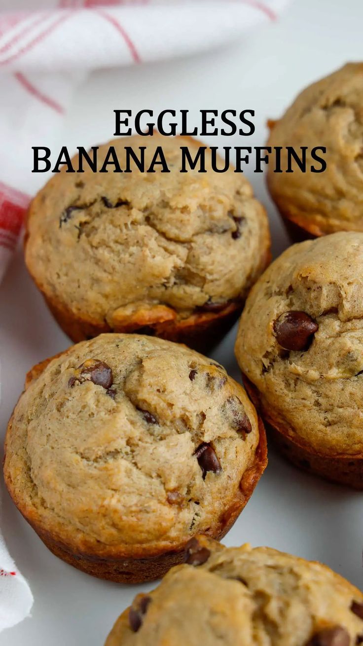 eggless banana muffins on a white plate with red and white checkered napkin