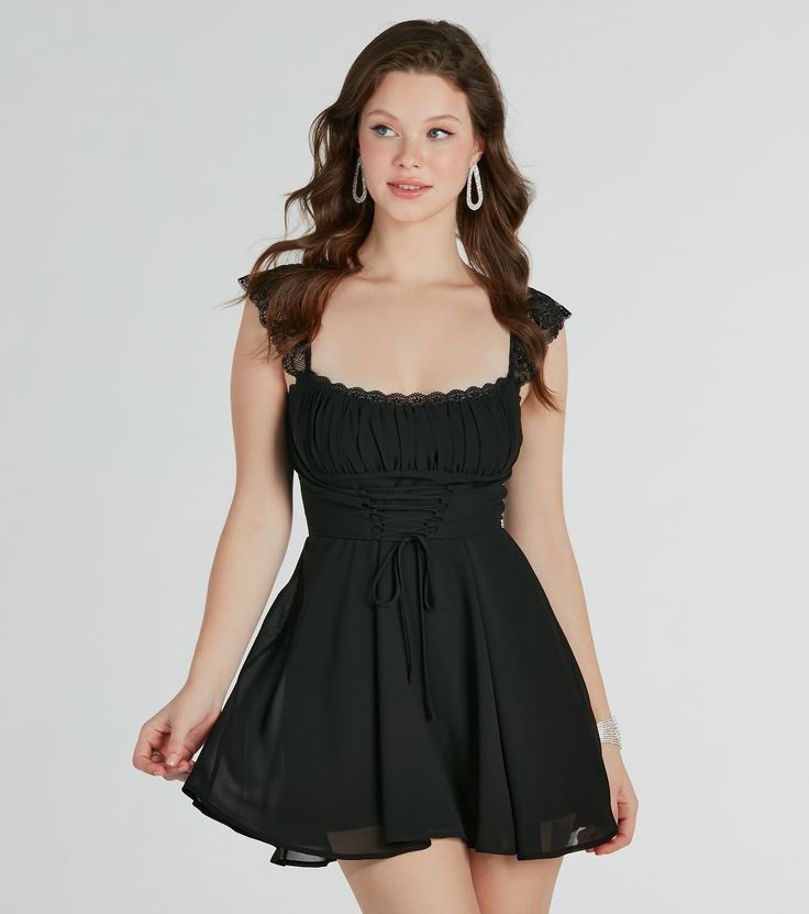 This adorable lace-trim woven corset skater dress will bring a dainty-chic style to your party look. The sheer stretch woven fabric offers an airy, lightweight feel with a knit lining for coverage. The short dress features a square neckline with a scalloped lace trim and sheer lace cap sleeves for the prettiest detail. The ruched bust leads to a corset front with a lace-up design for a snatched look. The high waist flows out to a skater skirt with a fit and flare silhouette. Complete your outfit with rhinestone heels for that pop of sparkle.Fit & FeaturesSheer stretch woven fabric with knit liningSquare neckline with scalloped lace trimSheer scalloped lace cap sleevesRuched bust, corset bodice with lace-up frontBack zipper, hook and eye closureHigh waist seam, skater skirt with fit and Lace Trim Mini Dress For Homecoming, Date Night Corset Dress With Lace Trim, Lace Trim Corset Dress For Date Night, Elegant Lace Trim Mini Dress For Homecoming, Spring Mini Corset Dress With Lace Bodice, Flirty Corset Dress With Lace Trim And Fitted Bodice, Party Lace Dresses With Smocked Bodice, Party Dresses With Smocked Lace Bodice, Spring Prom Corset Dress With Lace Trim