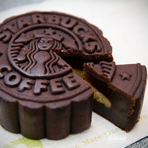 a chocolate cookie with the word coffee printed on it