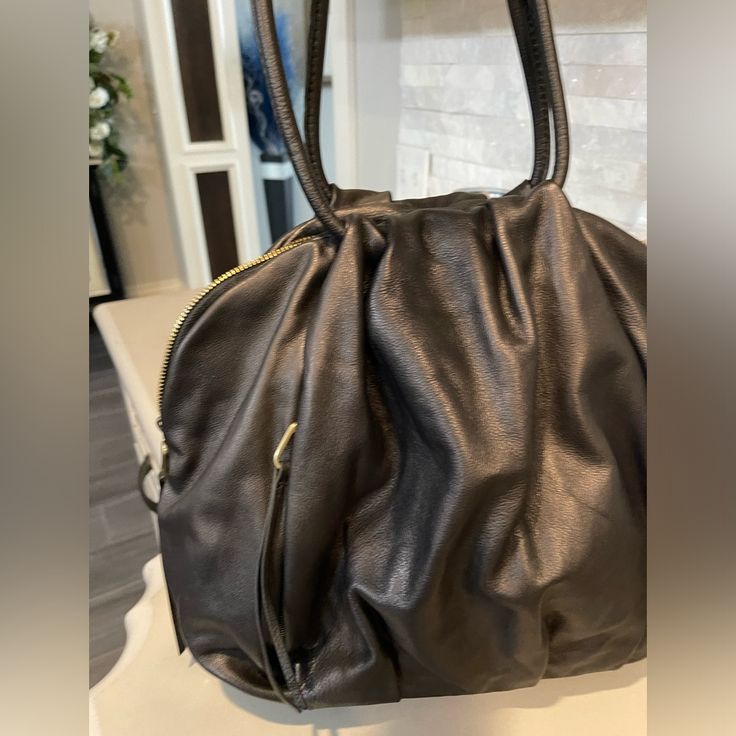 Beautiful Supple Leather Slouchy Hobo By Hobobags. This Hobo Has A Side Zip Pocket On Front And Top Double Zip Closure. Zip And Zip Pockets Inside For Organization And Inside Key Clip. Dust Bag. Color Black. Measures Approximately 10-1/2”W X 12-1/2”H X 5”D. 11” Handle Drop. Nwot. Elegant Hobo Shoulder Bag With Removable Pouch, Elegant Hobo Travel Bag, Elegant Hobo Bag For Travel, Elegant Black Hobo Shoulder Bag, Fall Black Hobo Bag For On-the-go, Elegant Black Hobo Bag With Leather Backing, Elegant Black Leather Hobo Bag, Black Hobo Bag With Removable Pouch For Fall, Elegant Hobo Satchel With Removable Pouch