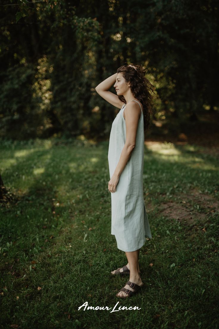 The Jakarta Linen Long Dress, a masterpiece of boho-inspired elegance in a casual and minimal aesthetic style. Perfect for a Thanksgiving outfit, Christmas outfit, a date night, or a casual look. This exquisite linen slip dress defines versatile fashion. It's essential piece in any woman's fall or winter wardrobe. Handmade from Linen. Pair it with a jacket for some chic look. Discover the epitome of women's fashion in this stunning piece. Free delivery on orders of 100$! Linen Long Dress, Linen Slip Dress, Minimalistic Outfits, Sleeveless Linen Dress, Outfit Christmas, Long Linen Dress, Minimal Aesthetic, Aesthetic Style, Thanksgiving Outfit