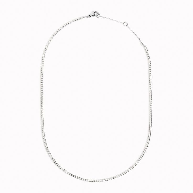 While traditional tennis necklaces are made with diamonds, this silver version is made with cubic zirconia stones that sparkle just as brilliantly as diamonds.


Cubic zirconia stone size: 1.5mm. Tennis Necklace, Necklace Silver, Silver Necklaces, Cubic Zirconia, Tennis, Diamonds, Sparkle, Necklaces, Stone