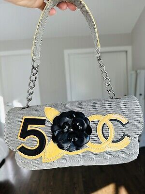 (eBay) Chanel No.5 Coco Small Canvas Flap Bag. Authentic Chanel No.5 bag Excellent pre owned condition 10x 5 1/2 x 2 Drop 7 3/4 *** measurements are approximate *** Designer Pre-owned Rectangular Shoulder Bag, Pre-owned Designer Shoulder Bag, Pre-owned Designer Satchel Shoulder Bag, Chanel No 5, Small Canvas, Flap Bag, Coco, Chanel, Canvas