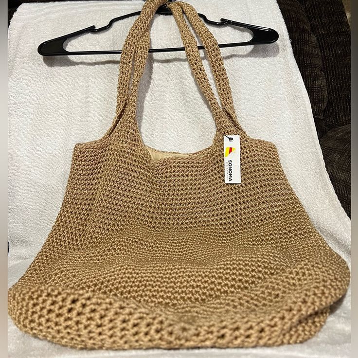 Brand New Water With Tags Beige Lightweight Straw Bag For Everyday Use, Lightweight Beige Straw Bag For Everyday, Everyday Lightweight Beige Straw Bag, Light Brown Summer Shoulder Bag For Everyday Use, Light Brown Casual Beach Bag, Everyday Light Brown Summer Shoulder Bag, Everyday Lightweight Brown Straw Bag, Lightweight Brown Bag For Everyday Use, Lightweight Casual Brown Bag