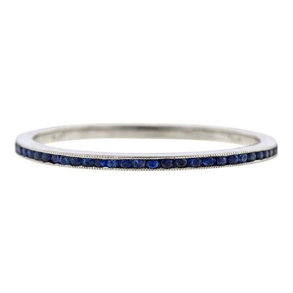 Measuring app.1.3mm wide, set with sapphires weighing app. .25ctw., fashioned in platinum. Contemporary. Size 6.5. This special order band is made to size. Please allow 10 weeks for delivery. Elegant Sapphire Stackable Eternity Band, Classic Sapphire Eternity Band For Anniversary, Classic Sapphire Eternity Band With Brilliant Cut, Silver Platinum Channel Set Sapphire Ring, Silver Platinum Sapphire Ring With Channel Set, Elegant White Gold Sapphire Eternity Band, Platinum Sapphire Ring With Channel Set, Classic Sapphire Eternity Band, Classic Sapphire Eternity Band With Round Cut