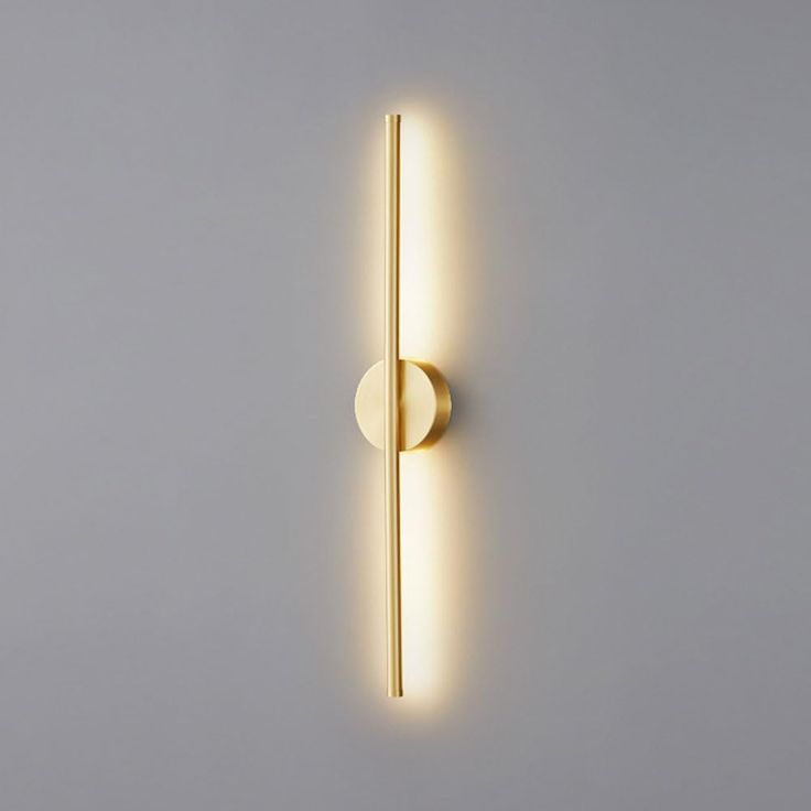 a wall mounted light that is on the side of a wall with a white background