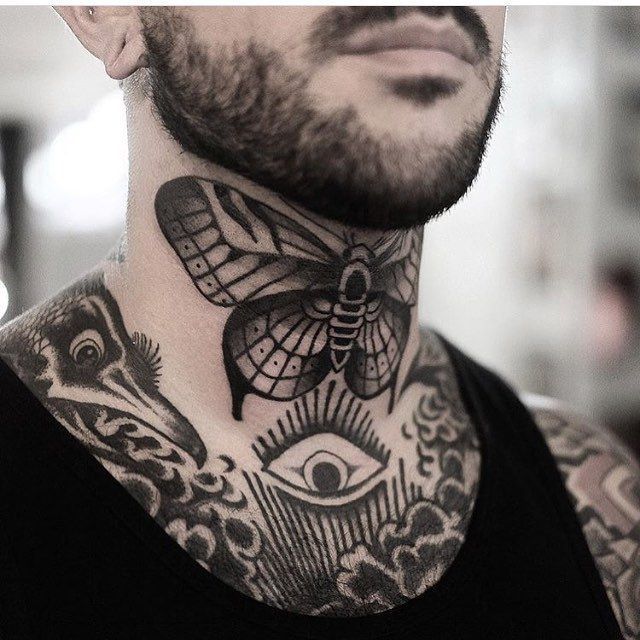 a man with tattoos on his neck has a butterfly and an eye in the background