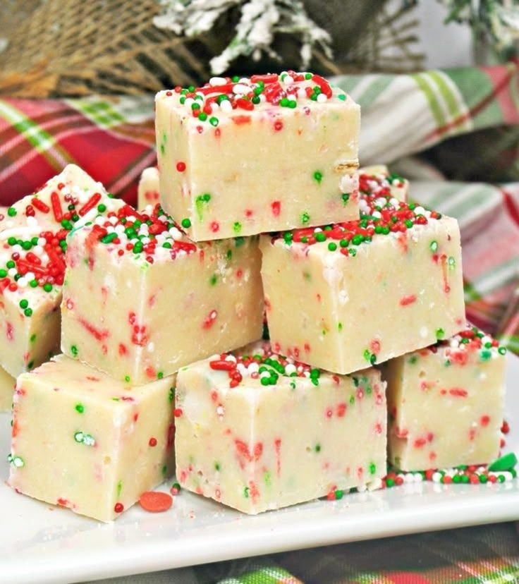 sugar cookie christmas fudge on a white plate