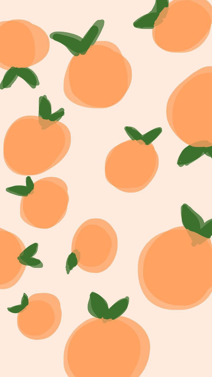 an orange pattern with green leaves on the top and bottom, against a light pink background