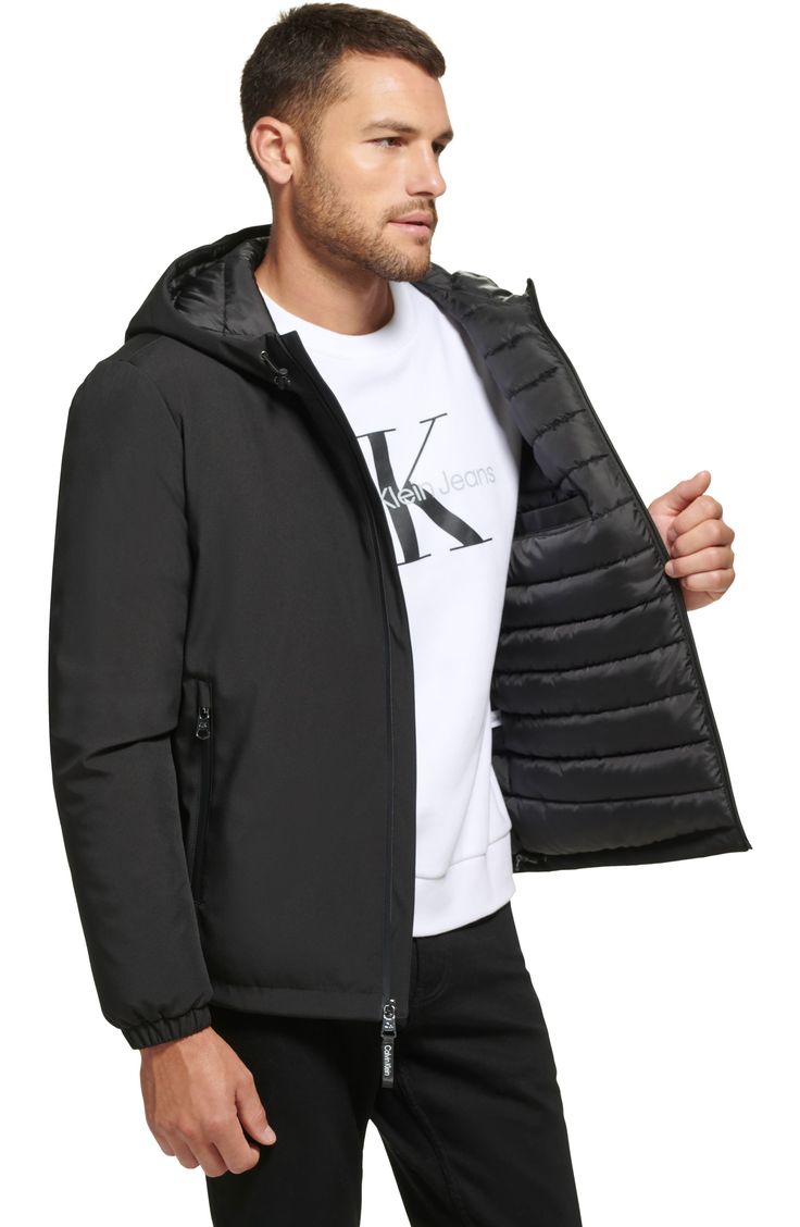 Layer on this sporty wind- and water-resistant jacket featuring drawcords at the hood and hem, secure zip pockets and warm quilted lining. Front zip closure Drawcord-toggle hood Elastic cuffs Chest zip pocket; front zip pockets Water-resistant Quilted lining 100% polyester Machine wash, tumble dry Imported Model stats: 6'1" height, 32" waist. Model is wearing size Medium. Sporty Hooded Puffer Jacket With Drawstring, Hooded Puffer Jacket With Zipper For Outdoor Activities, Hooded Puffer Jacket For Outdoor Activities, Hooded Nylon Quilted Jacket For Streetwear, Sporty Hooded Puffer Jacket With Adjustable Hood, Black Nylon Hooded Jacket With Drawstring, Black Hooded Jacket With Zipper For Outdoor Activities, Black Weatherproof Nylon Hooded Jacket, Sporty Hooded Nylon Puffer Jacket