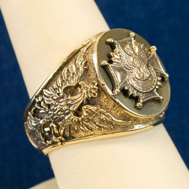 The design of this ring has been created for Catholic Bishops in Poland. Only selected were awarded with permission to wear it. Ring represents the Historic Polish White Eagle engraved on either side of the ring. The top design is an image of Our Lady of Czestochowa (Matka Boska Czestochowska) in front of Independence Eagle on top of the Scouts Badge. 14K Yellow Gold Ring face measures 0.562" x 0.687" Made in Poland Packaged in gift jewelry box. Gold prices fluctuate often. What you see online i Our Lady Of Czestochowa, Black Madonna, White Eagle, Scout Badges, Eagle Ring, Gold Price, Yellow Gold Ring, Gift Jewelry, Top Design