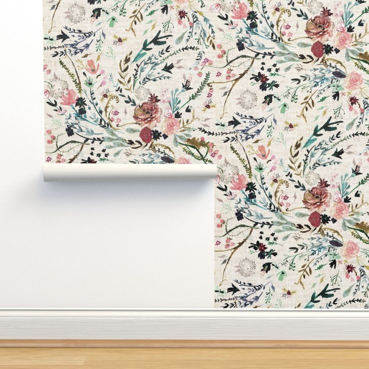 the wallpaper is decorated with flowers and leaves