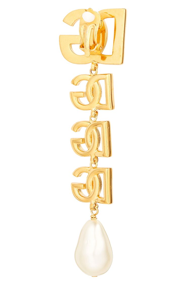 Bring Dolce&Gabbana's signature glamour to any look with these clip-on earrings flaunting goldtone logos and lustrous baroque imitation pearls. Clip-on style Nickel-free Hypoallergenic Goldtone plate/acrylic imitation pearl Made in Italy Luxury Gold-tone Jewelry With Logo Lettering, Elegant Dangle Jewelry With Logo Charm, Luxury Gold-tone Earrings With Logo Plaque, Luxury Gold Clip-on Earrings With Logo, Designer Yellow Gold Jewelry With Logo Lettering, Gold Designer Metal Clip-on Earrings, Luxury Gold Earrings With Logo Charm, Luxury Metal Clip-on Earrings, Elegant Gold Earrings With Logo Charm