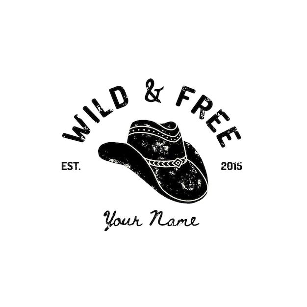 a cowboy hat with the words wild and free in black ink on a white background