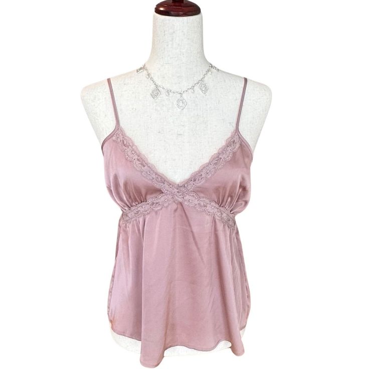 Cute Satin-Lace Cami Top Crisscross Lace Trim At The Front Lends A Little Beauty To This Flowy Camisole Top From Hippie Rose. Details: * Size : Medium (Measurements See Photos) * Color : Lilac-Mauve * Pullover With Adjustable Spaghetti Straps * Material: 95% Polyester, 2% Spandex * The Item In The Photos Is The Exact Item That Will Be Shipped. Condition: New Bundle And $Ave Love The Item But Not The Price? Make An Offer (Reminder Poshmark Gets 20%) About Me: *Always Open To Reasonable Offers (Re Purple Camisole Tank Top For Night Out, Feminine Sleeveless Purple Top, Pink Sleeveless Tank Top With Delicate Straps, Fitted Lavender Sleeveless Camisole, Fitted Sleeveless Lavender Camisole, Feminine Purple Camisole Top, Chic Purple Cami Tank Top, Purple Camisole For Night Out In Spring, Elegant Purple Camisole For Summer