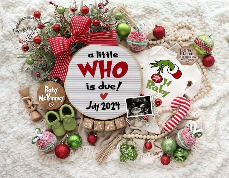 a baby's first christmas ornament surrounded by ornaments and other holiday items